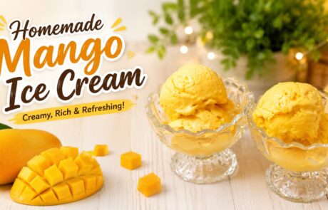 Homemade mango ice cream in glass bowls with a sliced mango on a wooden table; bold text reads 'Homemade Mango Ice Cream' and 'Creamy, Rich & Refreshing!'